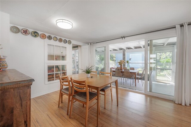 604 W Hilda St, Tampa, FL 33603 - dining area featuring light wood finished floors and baseboards