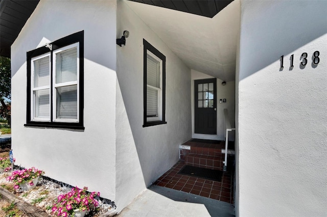 1138 Howard St, Clearwater, FL 33756 - property entrance featuring stucco siding