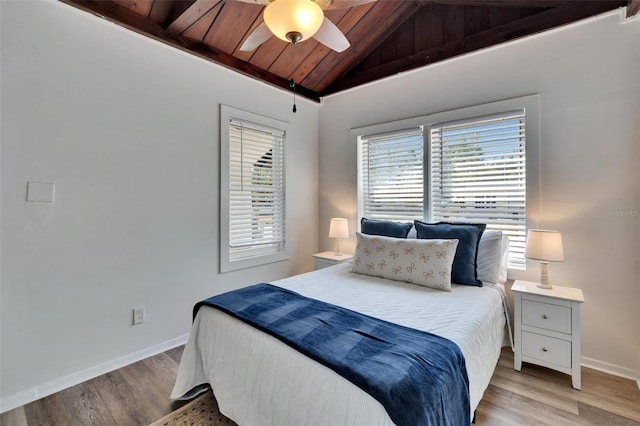 1138 Howard St, Clearwater, FL 33756 - bedroom featuring light wood finished floors, baseboards, ceiling fan, vaulted ceiling, and wooden ceiling