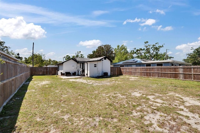 1138 Howard St, Clearwater, FL 33756 - view of yard featuring a fenced backyard