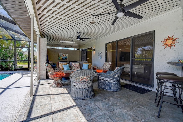 10 Arbor Ln, Oldsmar, FL 34677 - view of patio featuring ceiling fan, outdoor lounge area, and a lanai
