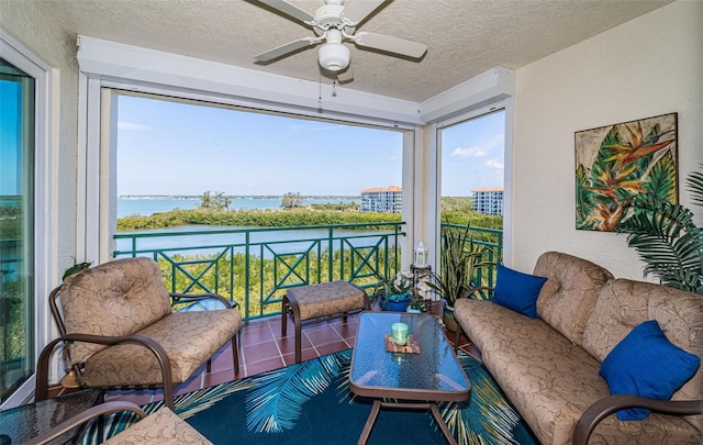 4801 Osprey Dr S Unit 508, Saint Petersburg, FL 33711 - sunroom / solarium featuring an outdoor living space, a water view, and a ceiling fan