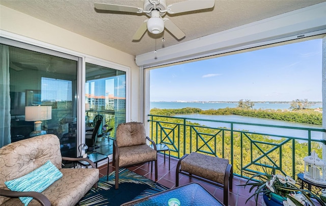 4801 Osprey Dr S Unit 508, Saint Petersburg, FL 33711 - balcony with a water view and a ceiling fan