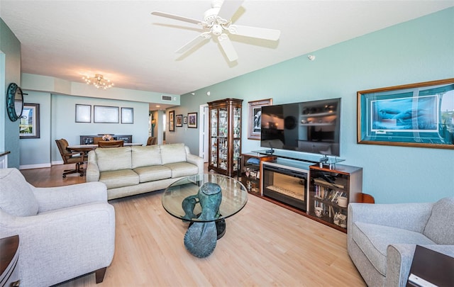 4801 Osprey Dr S Unit 508, Saint Petersburg, FL 33711 - living area with ceiling fan and wood finished floors