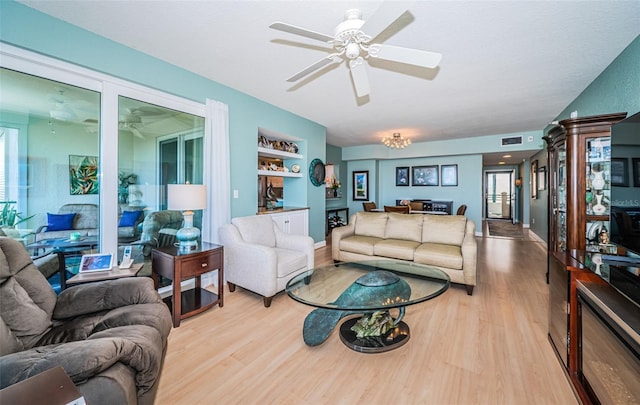 4801 Osprey Dr S Unit 508, Saint Petersburg, FL 33711 - living area with visible vents, wood finished floors, and ceiling fan