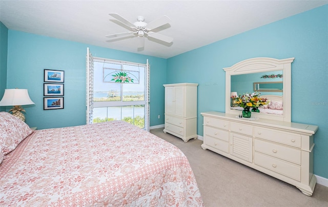4801 Osprey Dr S Unit 508, Saint Petersburg, FL 33711 - bedroom with a ceiling fan, a water view, baseboards, and light colored carpet