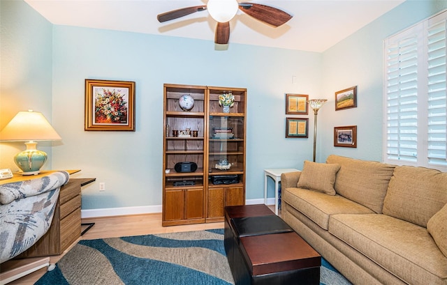 4801 Osprey Dr S Unit 508, Saint Petersburg, FL 33711 - living area featuring baseboards, light wood-style floors, and ceiling fan