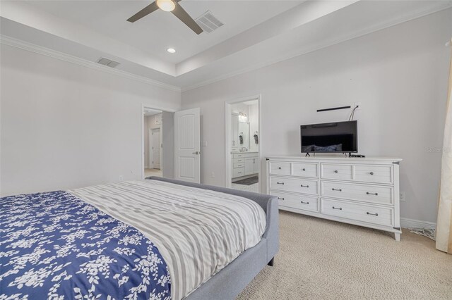16306 1st St E, Redington Beach, FL 33708 - bedroom with recessed lighting, light carpet, a tray ceiling, and visible vents