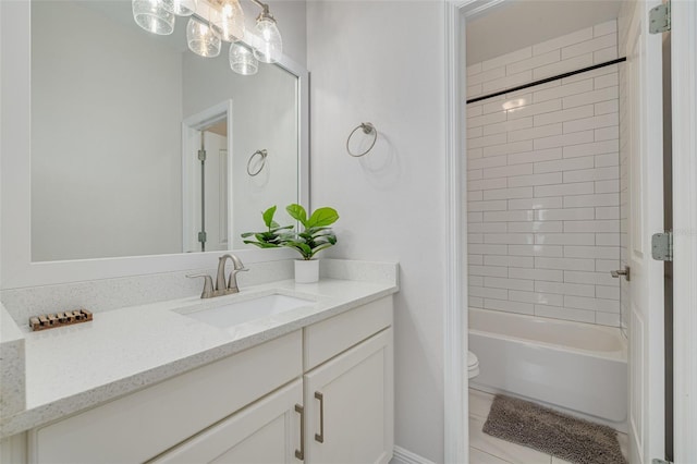 16306 1st St E, Redington Beach, FL 33708 - bathroom featuring bathing tub / shower combination, toilet, and vanity