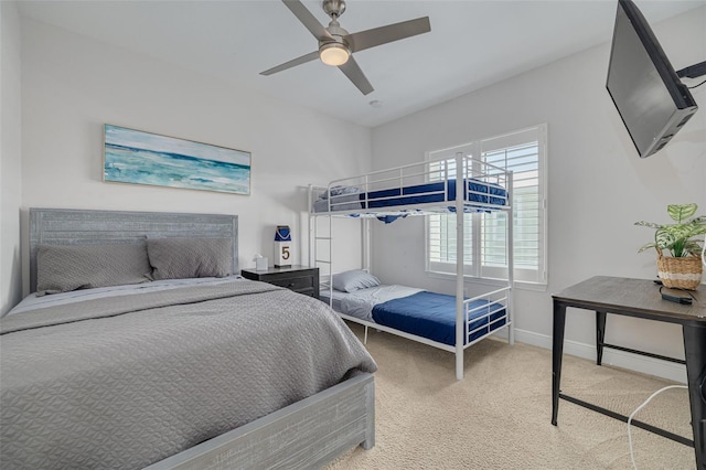 16306 1st St E, Redington Beach, FL 33708 - carpeted bedroom with baseboards and a ceiling fan
