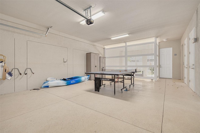 16306 1st St E, Redington Beach, FL 33708 - garage featuring a garage door opener