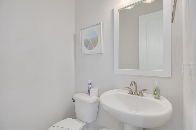 16306 1st St E, Redington Beach, FL 33708 - half bath with toilet and a sink