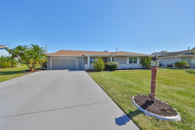 ranch-style house featuring an attached garage, a front lawn, and concrete driveway