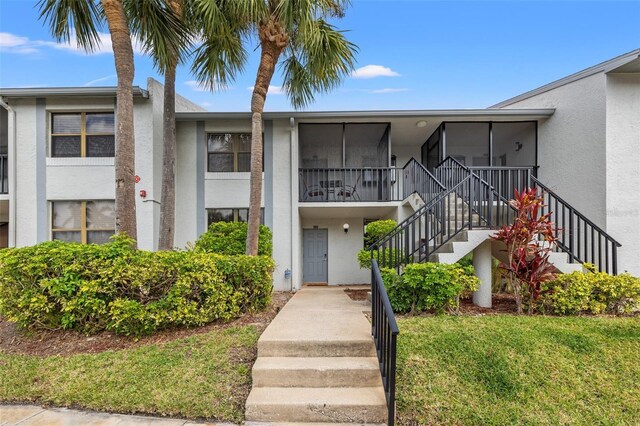 1998 Blue Hawk Ct Unit 1613, Clearwater, FL 33762 - view of building exterior featuring stairway
