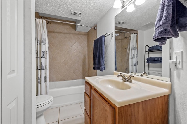 1998 Blue Hawk Ct Unit 1613, Clearwater, FL 33762 - bathroom featuring vanity, tile patterned floors, toilet, and shower / bath combo with shower curtain