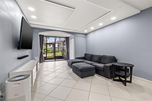 1998 Blue Hawk Ct Unit 1613, Clearwater, FL 33762 - living room with arched walkways, recessed lighting, and light tile patterned flooring