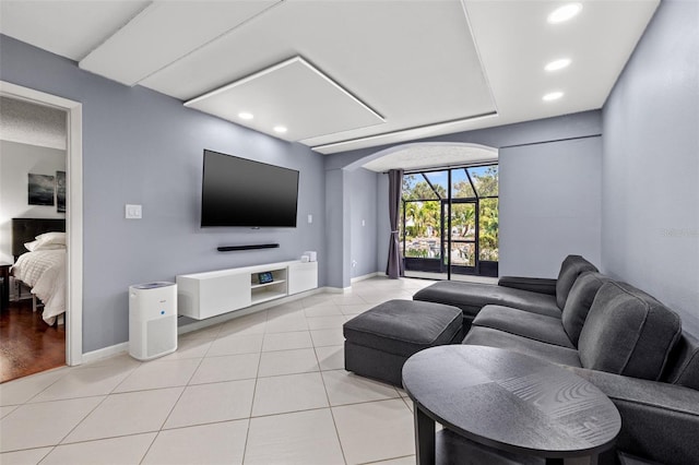 1998 Blue Hawk Ct Unit 1613, Clearwater, FL 33762 - living area with light tile patterned floors, baseboards, and recessed lighting