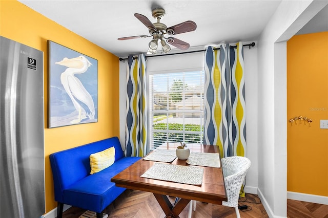 14019 Notreville Way, Tampa, FL 33624 - dining room with baseboards and ceiling fan