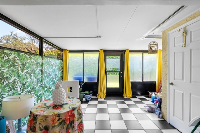 14019 Notreville Way, Tampa, FL 33624 - sunroom / solarium with tile patterned floors