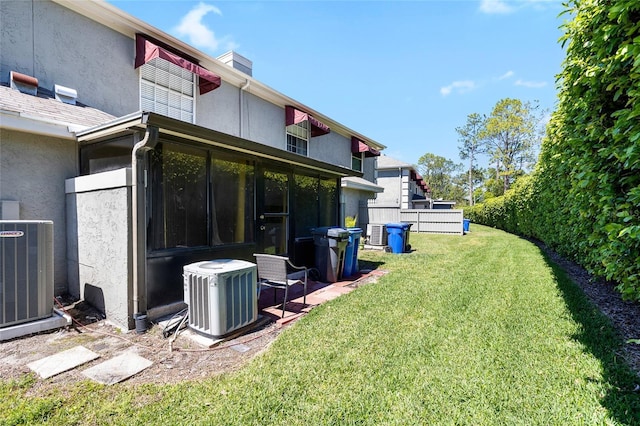 14019 Notreville Way, Tampa, FL 33624 - view of yard with central air condition unit