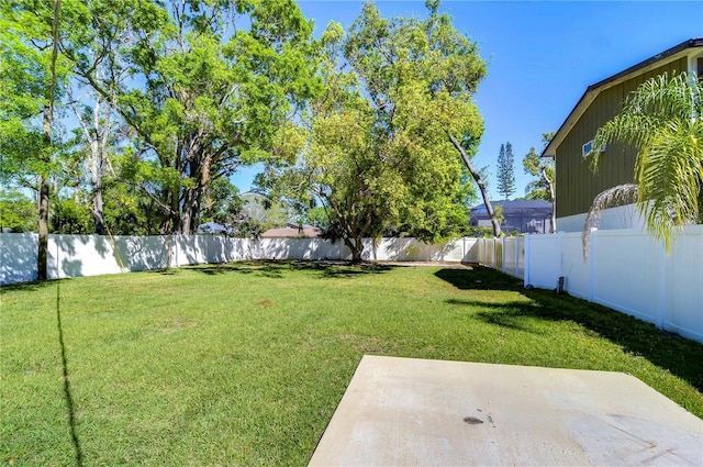 804 Shore Dr W, Oldsmar, FL 34677 - view of yard featuring a fenced backyard and a patio area