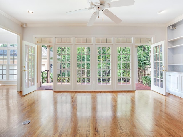 unfurnished sunroom featuring french doors