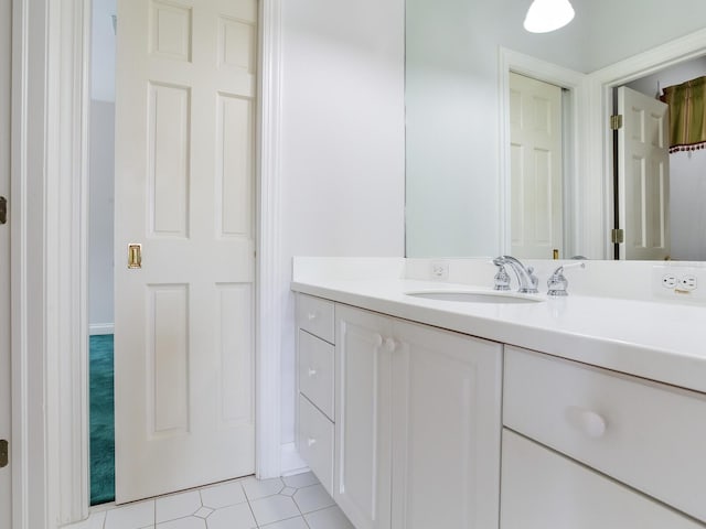 bathroom featuring vanity and tile patterned flooring