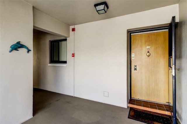 895 S Gulfview Blvd Unit 309, Clearwater Beach, FL 33767 - view of exterior entry with stucco siding
