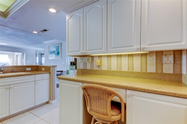 895 S Gulfview Blvd Unit 309, Clearwater Beach, FL 33767 - kitchen featuring white cabinets, a sink, and recessed lighting