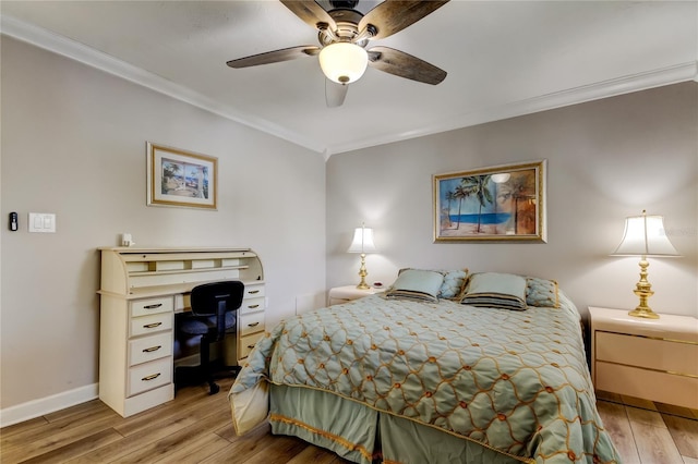 895 S Gulfview Blvd Unit 309, Clearwater Beach, FL 33767 - bedroom with light wood-style flooring, ornamental molding, baseboards, and ceiling fan