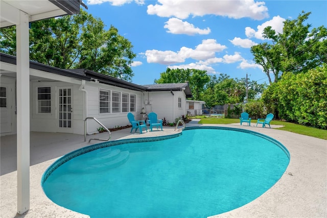 11361 88th Ave, Seminole, FL 33772 - view of swimming pool with a patio area and fence