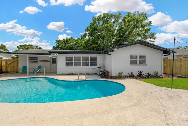 11361 88th Ave, Seminole, FL 33772 - back of house with a patio area and fence