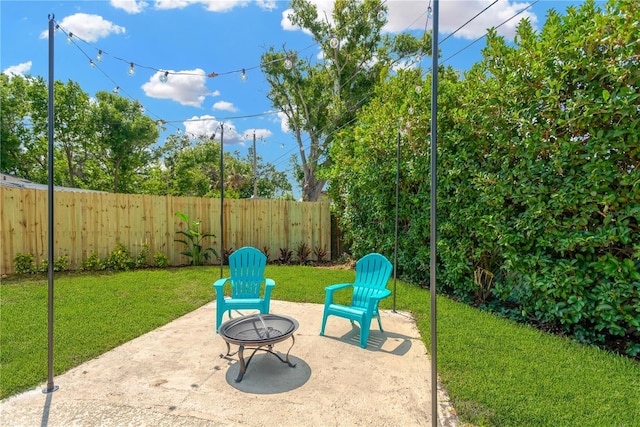11361 88th Ave, Seminole, FL 33772 - view of patio featuring an outdoor fire pit