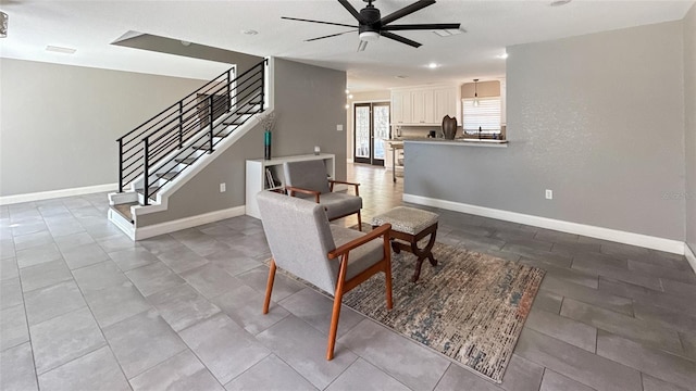 5235 Nichols Dr E, Lakeland, FL 33812 - interior space featuring baseboards, ceiling fan, and stairway