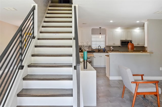 5235 Nichols Dr E, Lakeland, FL 33812 - stairs with visible vents and recessed lighting