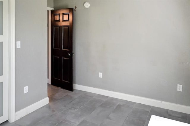 5235 Nichols Dr E, Lakeland, FL 33812 - empty room with baseboards