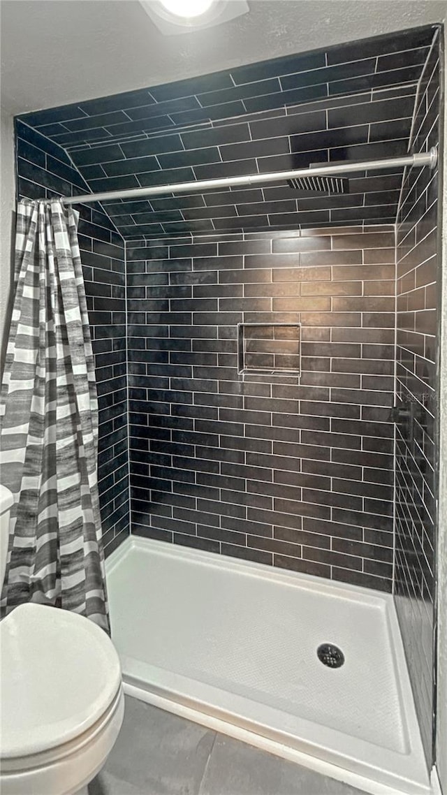 5235 Nichols Dr E, Lakeland, FL 33812 - full bathroom with toilet and a stall shower
