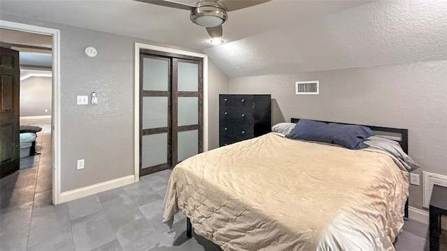 5235 Nichols Dr E, Lakeland, FL 33812 - bedroom with baseboards, a closet, vaulted ceiling, and visible vents