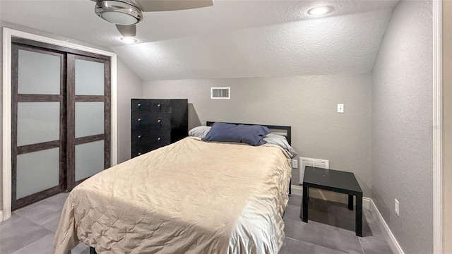 5235 Nichols Dr E, Lakeland, FL 33812 - bedroom featuring visible vents, a textured wall, and a textured ceiling
