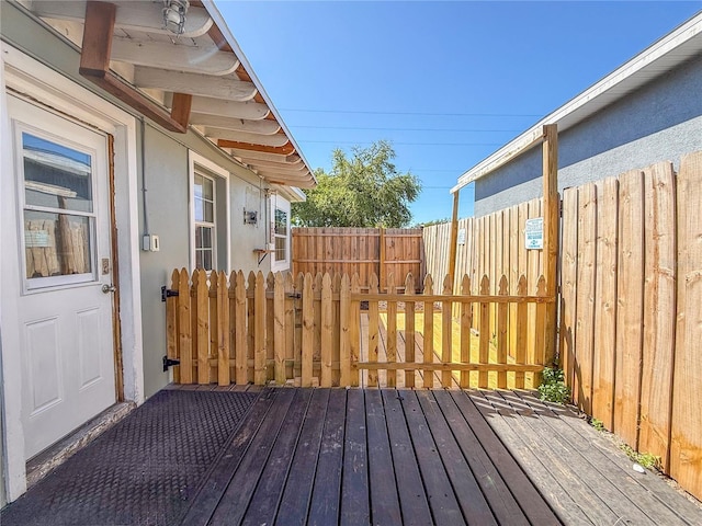 wooden deck featuring fence