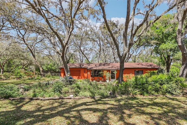 back of house with a yard