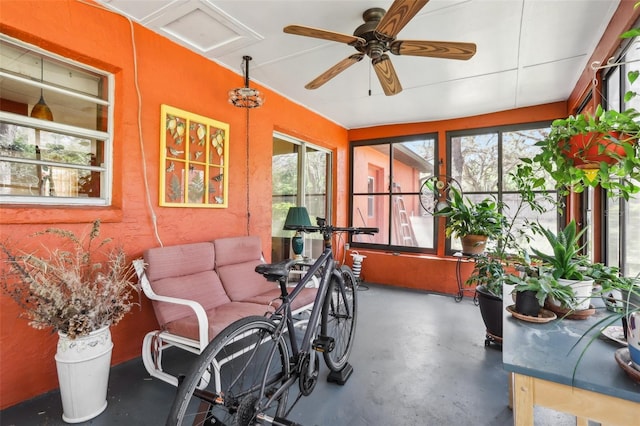 sunroom with concrete floors