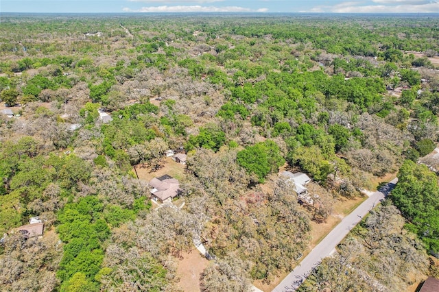 aerial view featuring a view of trees