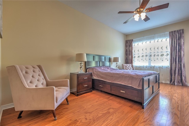 2218 132nd Pl E, Parrish, FL 34219 - bedroom with a ceiling fan, light wood-type flooring, and lofted ceiling