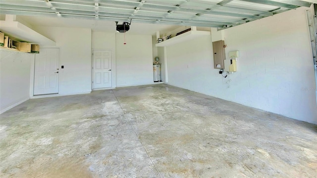 2218 132nd Pl E, Parrish, FL 34219 - garage with electric panel, water heater, and a garage door opener