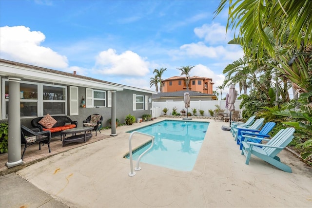 7912 3rd Ave S, Saint Petersburg, FL 33707 - view of pool with a patio area, a fenced backyard, and an outdoor hangout area