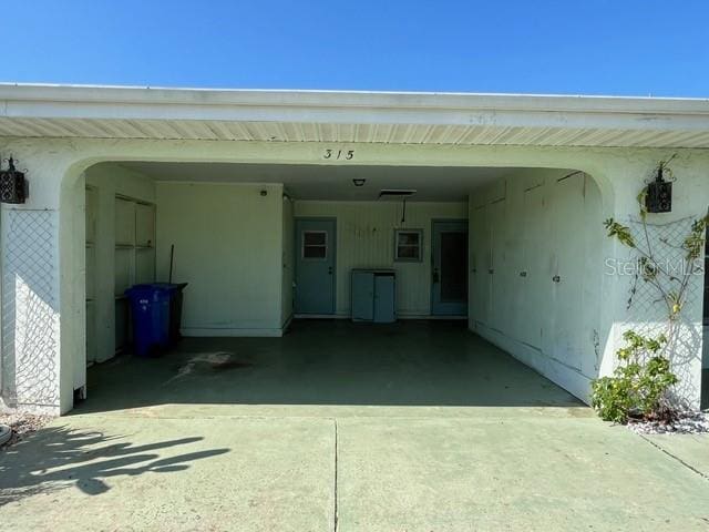 garage with driveway