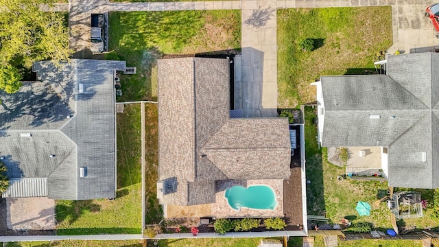 drone / aerial view of a pool area