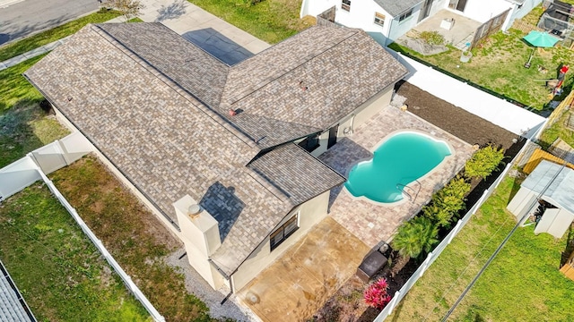view from above of property with a pool area