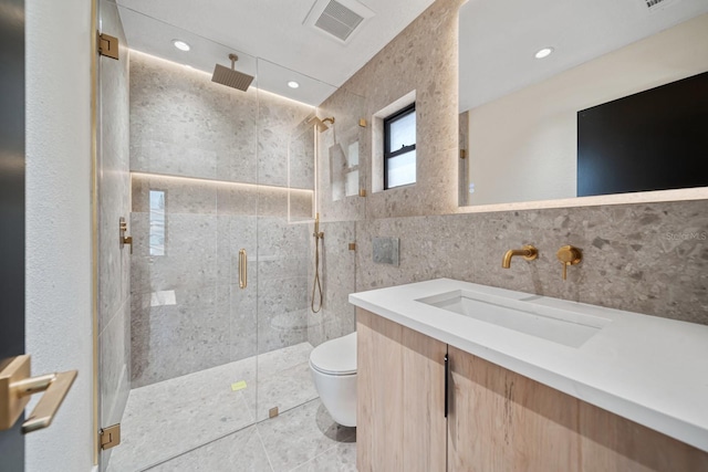 1981 Briarwood St, Dunedin, FL 34698 - full bath with tile walls, a shower stall, vanity, recessed lighting, and tile patterned flooring